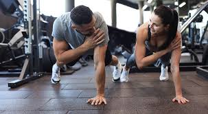 Toning Bingo Wings: Your Ultimate Guide to Sculpting Sleek Arms at the Gym 3 Fitness trainer demonstrating arm toning exercises Hertford
