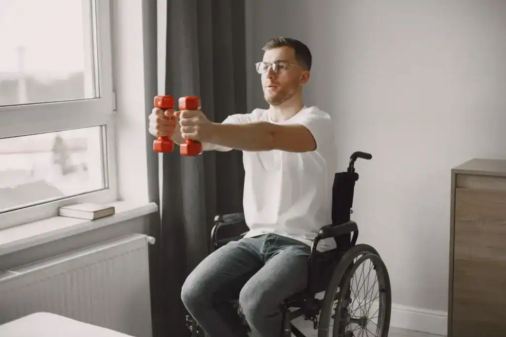 Image of man doing exercise in his wheelchair to aid weight loss Hertford